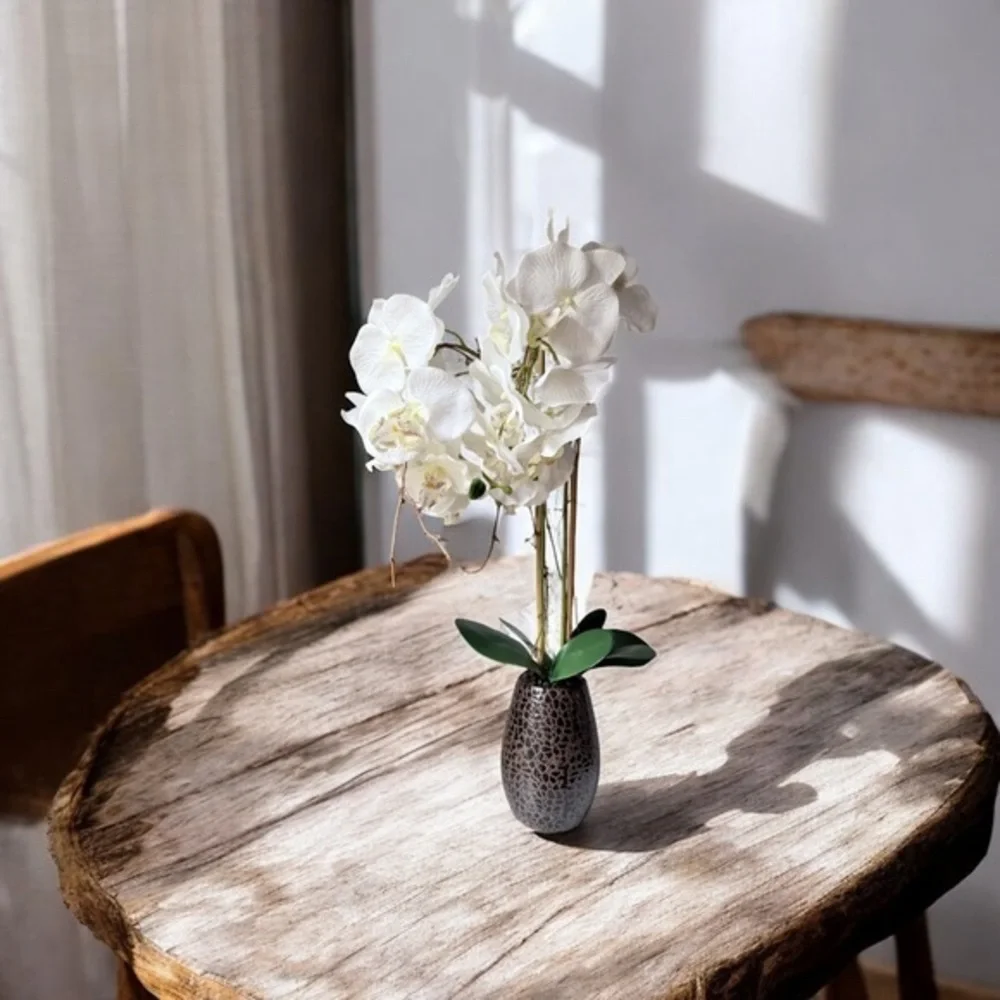 artificial white Phalaenopsis orchid arrangement in a brown textured vase 27”….